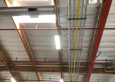 Industrial plumbing in warehouse
