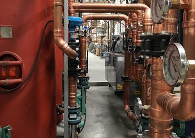 Industrial plumbing at manufacturing facility